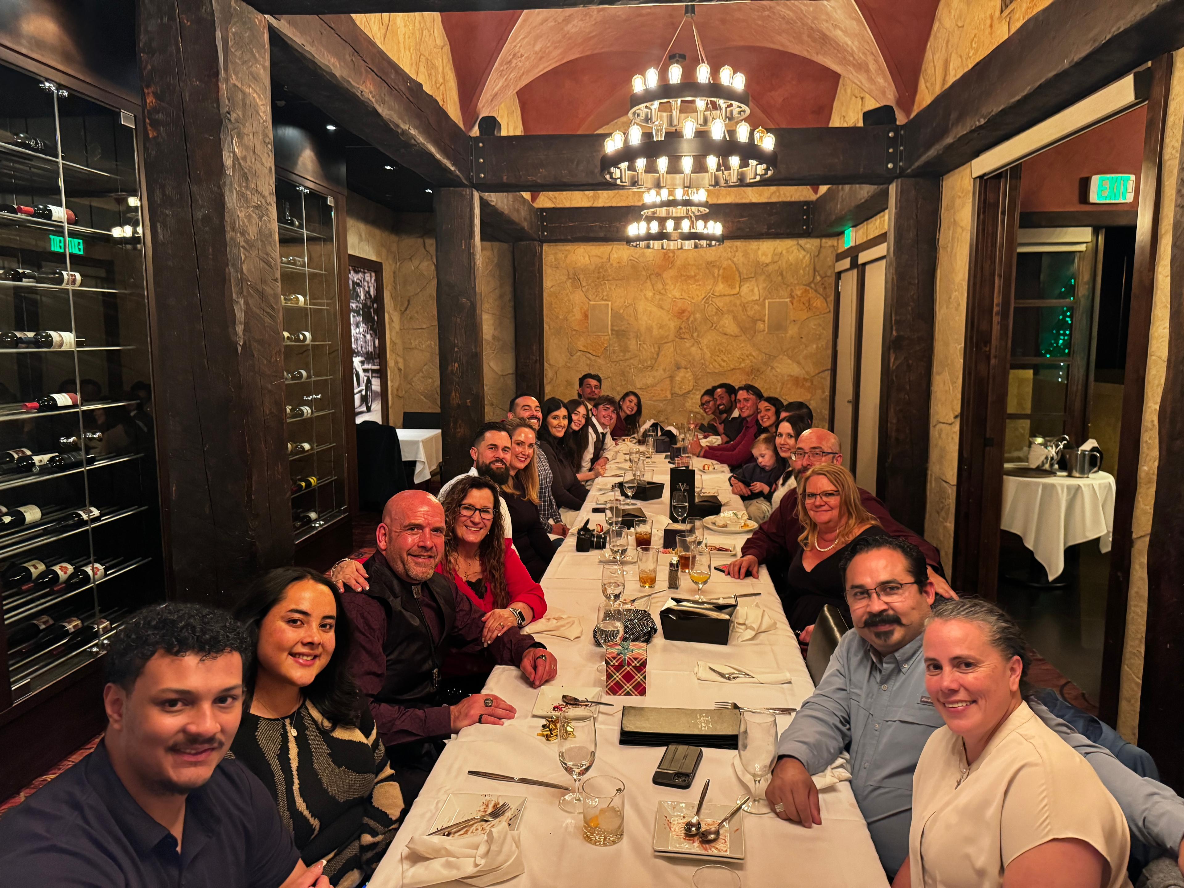 The Guhrke Company team gathered together as a family-oriented crew